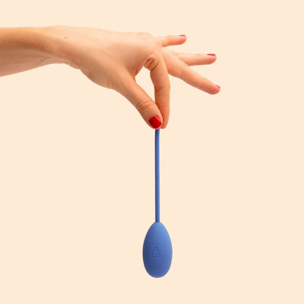 boule de kegel tenu par une main